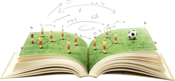 Open book with green grass soccer stadium